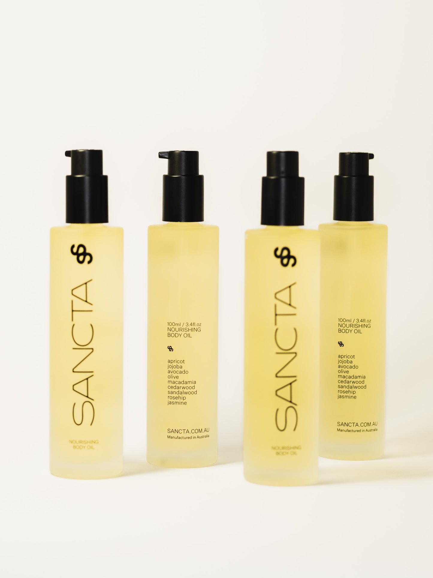 Sancta-Solis-Nourishing-Body-Oil_Apricot, jojoba, avocado, olive, macadamia, cedarwood, australian sandalwood, rosehip and jasmine. Product shot of 4 bottles against white background. Sancta Solis Nourishing Body Oil_Made in Australia_All Natural beauty product_Antioxidant Rich and hydrating for dry skin. Non greasy with a light dry finish