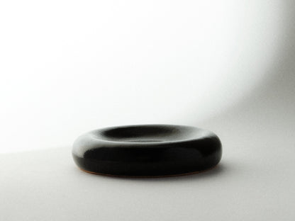 THE OIL PEBBLE