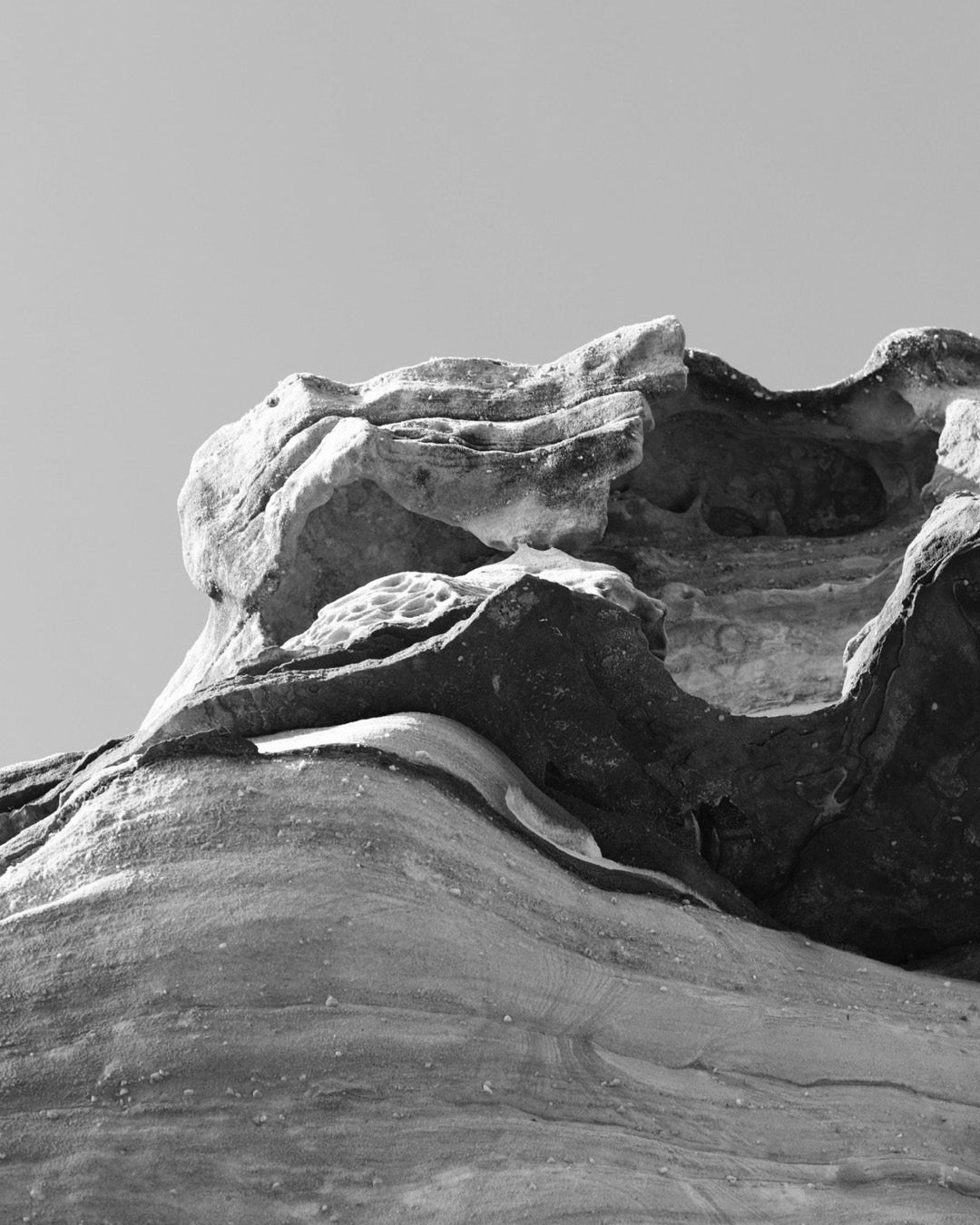 A picture of rocks against the sky in black and white. Photographer: Christopher Hendriks